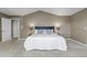 Main bedroom with ensuite access and carpet at 10646 Amesbury Way, Highlands Ranch, CO 80126