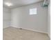 A walk-in closet features hooks for hanging clothes and a wire shelf for holding folded items at 10646 Amesbury Way, Highlands Ranch, CO 80126