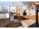 Private backyard with modern wood fence and attached carport at 2809 Forest St, Denver, CO 80207