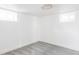 Bright, finished basement room with gray carpeting at 2809 Forest St, Denver, CO 80207