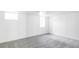 Spacious finished basement room with gray carpeting at 2809 Forest St, Denver, CO 80207