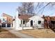 Updated home with driveway, landscaping, and a modern style at 2809 Forest St, Denver, CO 80207