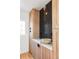 Well-designed pantry with wood cabinets and quartz countertop at 2809 Forest St, Denver, CO 80207