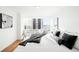 Main bedroom with large windows and city views at 3100 E Cherry Creek South Dr # 903, Denver, CO 80209