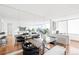 Bright dining area with large windows and modern table at 3100 E Cherry Creek South Dr # 903, Denver, CO 80209