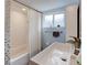 Modern bathroom featuring a unique vessel sink and stylish tile work at 737 La Farge Ave, Louisville, CO 80027