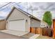 Exterior shot of the garage featuring a white door at 737 La Farge Ave, Louisville, CO 80027