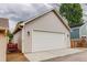 Detached one-car garage with neutral siding and a white garage door; ample parking and storage included at 737 La Farge Ave, Louisville, CO 80027