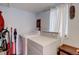Well-equipped laundry room with washer, dryer, and storage at 737 La Farge Ave, Louisville, CO 80027