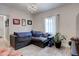 Comfortable living room with a large sofa and bright window at 737 La Farge Ave, Louisville, CO 80027