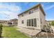Back of home featuring a patio and a spacious lawn at 1886 Makley Loop, Castle Rock, CO 80104