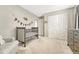 Inviting Bedroom room featuring a cozy crib, comfortable seating, and a dresser for ample storage at 1886 Makley Loop, Castle Rock, CO 80104
