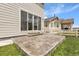 A backyard patio with great space that has a decorative tile and a large sliding glass door at 1886 Makley Loop, Castle Rock, CO 80104