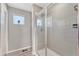 Clean and spacious walk-in shower with tile surround at 1886 Makley Loop, Castle Rock, CO 80104