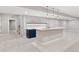 Finished basement with wet bar, tile backsplash, pendant lighting, and carpeted floors at 1425 Burt Ave, Berthoud, CO 80513
