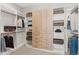 Spacious closet with shelving units, cabinets, and hanging racks at 1425 Burt Ave, Berthoud, CO 80513