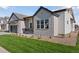 Charming single-Gathering home with well-manicured lawn, inviting covered porch, and detailed design at 1425 Burt Ave, Berthoud, CO 80513