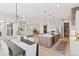 Spacious kitchen and dining area with an open concept to the living area. Lots of natural light at 1425 Burt Ave, Berthoud, CO 80513