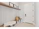 Well-organized mudroom featuring a bench with storage, shelving, and ample space for coats and shoes at 1425 Burt Ave, Berthoud, CO 80513