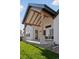 Covered rear patio perfect for relaxing or entertaining in a stylish outdoor space at 1425 Burt Ave, Berthoud, CO 80513