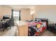 Bedroom with a window and an eclectic aesthetic at 1240 S Idalia St, Aurora, CO 80017
