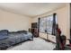Bedroom featuring a window, bed, and media stand at 1240 S Idalia St, Aurora, CO 80017