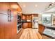 Modern kitchen featuring stainless steel appliances, wood cabinetry, and sleek countertops, great for cooking enthusiasts at 8100 E Union Ave # 310, Denver, CO 80237