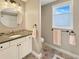 Well-lit bathroom featuring tile flooring, granite countertops, and a modern sink at 14475 Crabapple Rd, Golden, CO 80401
