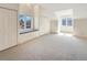 Bright bedroom featuring natural light, large windows, and ample closet space at 14475 Crabapple Rd, Golden, CO 80401