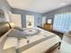 Comfortable main bedroom featuring a blue accent wall and ample natural light at 14475 Crabapple Rd, Golden, CO 80401