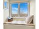 Cozy window seat with ample sunlight, a perfect place to relax and unwind at 14475 Crabapple Rd, Golden, CO 80401