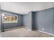 This is a light-filled bedroom featuring neutral tones and carpeting at 2016 W 101St Ave, Thornton, CO 80260