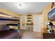 Bedroom featuring a bunk bed, carpet, and desk with shelves at 18496 Keyser Creek Ave, Parker, CO 80134