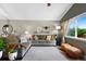 Bright living room showcases a comfortable sectional sofa, stylish decor, and a large window at 18496 Keyser Creek Ave, Parker, CO 80134