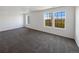 Spacious bedroom with large windows overlooking scenic views at 12713 Leyden St # E, Thornton, CO 80602