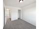 Bedroom with a large closet and neutral carpeting at 12713 Leyden St # E, Thornton, CO 80602
