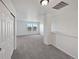Upstairs living area with bright windows and neutral carpeting at 12713 Leyden St # E, Thornton, CO 80602
