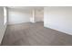 Spacious upstairs living area with large windows for natural light at 12713 Leyden St # E, Thornton, CO 80602