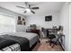 Bedroom with neutral-toned walls, ceiling fan, and desk perfect for studying at 1537 S Owens St # 31, Denver, CO 80232