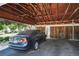Carport featuring covered parking spot at 1537 S Owens St # 31, Denver, CO 80232