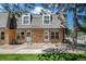 Charming townhomes with well maintained brick facade and beautiful landscaping at 1537 S Owens St # 31, Denver, CO 80232