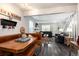 Open living space with dining area, comfortable sofas, and staircase access at 1537 S Owens St # 31, Denver, CO 80232