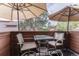 Cozy balcony with seating and outdoor umbrella, perfect for relaxing at 262 Yank Ct, Lakewood, CO 80228