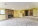 Finished basement features a fireplace, carpeted floor and natural lighting at 262 Yank Ct, Lakewood, CO 80228