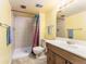 Bathroom featuring a stand up shower, toilet, vanity and sink at 262 Yank Ct, Lakewood, CO 80228