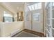 Spacious foyer with high ceilings, skylight, beautiful wood floors, and a stylish rug at 262 Yank Ct, Lakewood, CO 80228