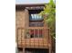 Inviting front entryway featuring a charming wooden deck, double doors, and transom window at 262 Yank Ct, Lakewood, CO 80228