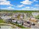Aerial view highlighting property location with walking paths, playground, and surrounding neighborhood at 800 Meadowlark Dr, Erie, CO 80516