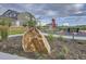 Community park featuring a playground, open green spaces, and walking paths, located near residential homes at 800 Meadowlark Dr, Erie, CO 80516