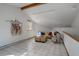 Living room featuring vaulted ceilings, a large window, and stylish decor at 11220 S Deer Creek Rd, Littleton, CO 80127